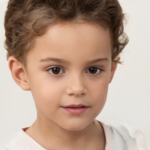 Joyful white child female with short  brown hair and brown eyes