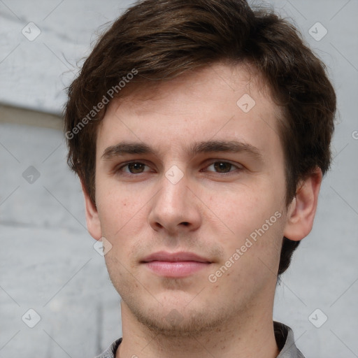 Neutral white young-adult male with short  brown hair and grey eyes