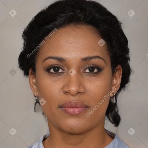 Joyful black young-adult female with medium  black hair and brown eyes