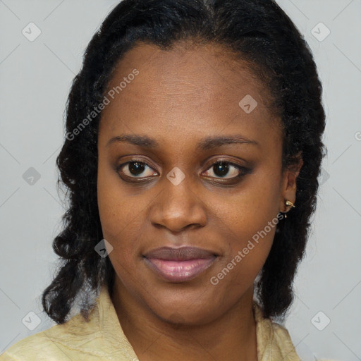 Joyful black young-adult female with medium  brown hair and brown eyes