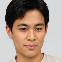 Neutral asian young-adult male with short  brown hair and brown eyes