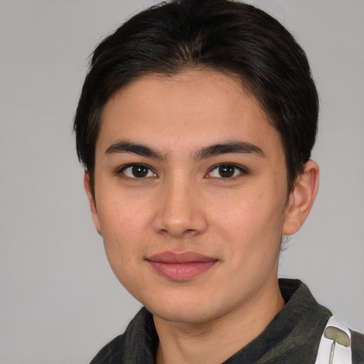 Joyful asian young-adult male with medium  brown hair and brown eyes