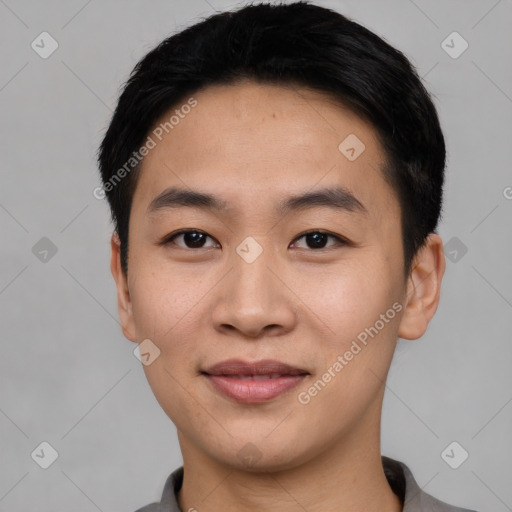 Joyful asian young-adult male with short  black hair and brown eyes