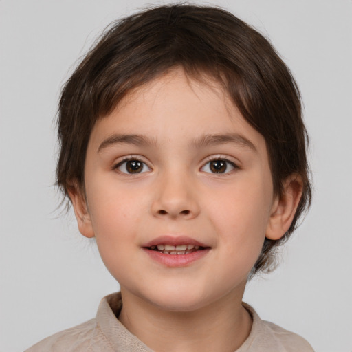 Joyful white child female with medium  brown hair and brown eyes