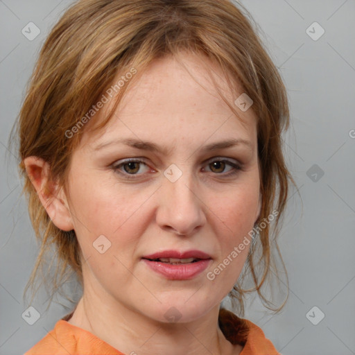 Joyful white adult female with medium  brown hair and blue eyes