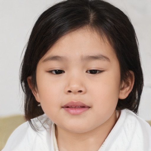 Neutral asian child female with medium  brown hair and brown eyes