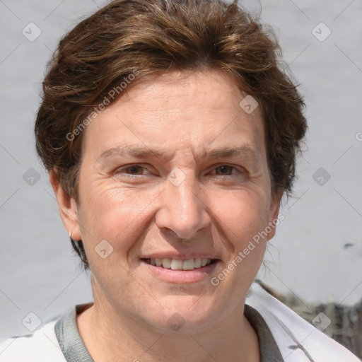 Joyful white adult female with short  brown hair and grey eyes