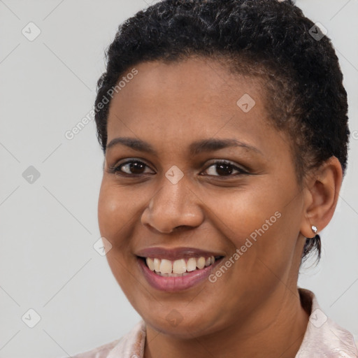 Joyful latino young-adult female with short  brown hair and brown eyes