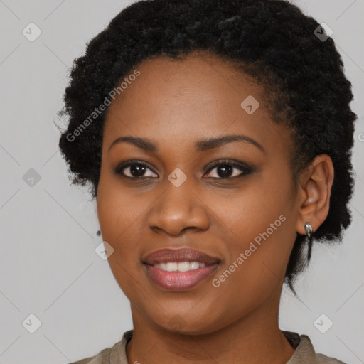 Joyful black young-adult female with medium  black hair and brown eyes