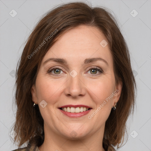 Joyful white young-adult female with medium  brown hair and green eyes