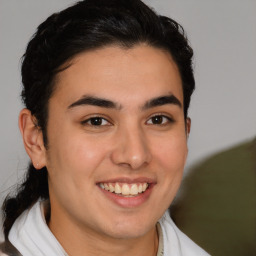 Joyful white young-adult male with medium  brown hair and brown eyes