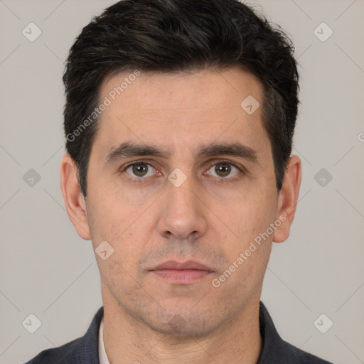 Neutral white adult male with short  black hair and brown eyes