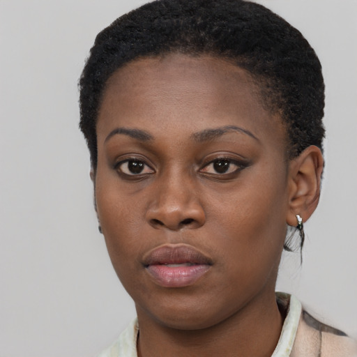 Neutral black young-adult female with short  black hair and brown eyes