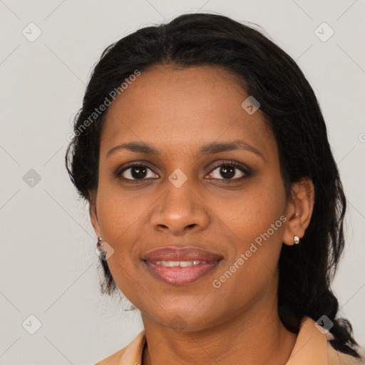 Joyful black young-adult female with medium  black hair and brown eyes