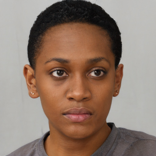 Neutral black young-adult female with short  black hair and brown eyes