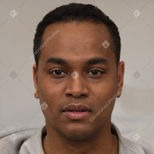 Neutral latino young-adult male with short  black hair and brown eyes