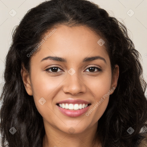 Joyful latino young-adult female with long  brown hair and brown eyes