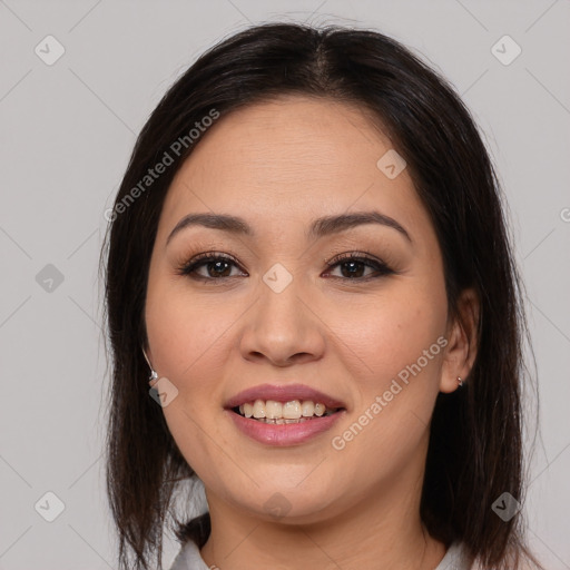 Joyful asian young-adult female with medium  brown hair and brown eyes