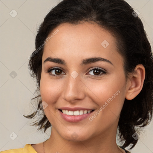 Joyful white young-adult female with medium  brown hair and brown eyes