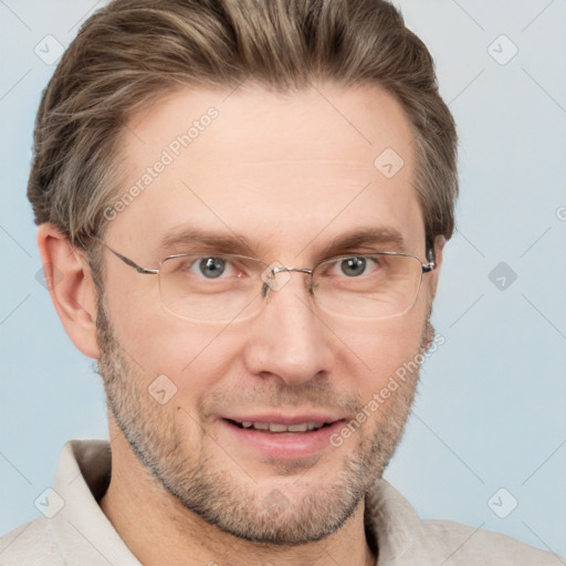 Joyful white adult male with short  brown hair and grey eyes