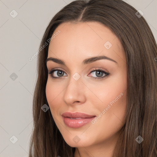 Neutral white young-adult female with long  brown hair and brown eyes