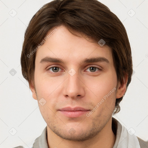 Neutral white young-adult male with short  brown hair and grey eyes