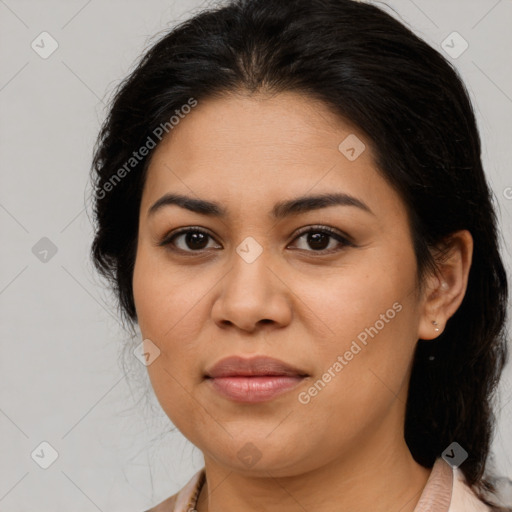 Joyful latino young-adult female with medium  brown hair and brown eyes