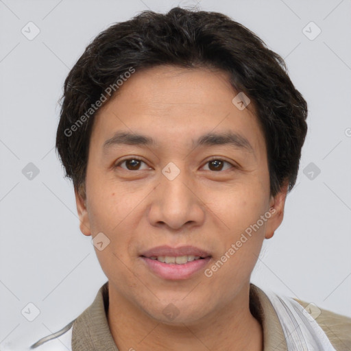 Joyful white adult male with short  brown hair and brown eyes