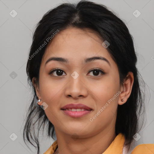 Joyful asian young-adult female with medium  black hair and brown eyes