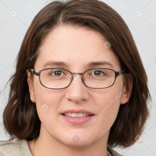 Joyful white young-adult female with medium  brown hair and grey eyes