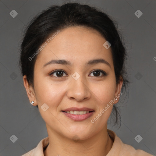 Joyful latino young-adult female with medium  brown hair and brown eyes