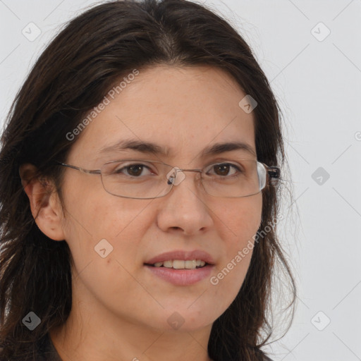 Joyful white adult female with long  brown hair and brown eyes