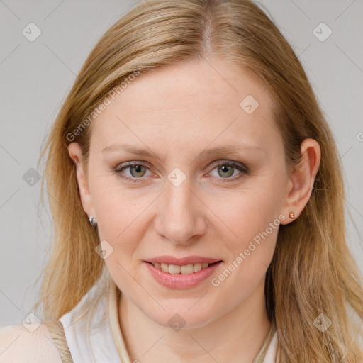 Joyful white young-adult female with long  brown hair and blue eyes