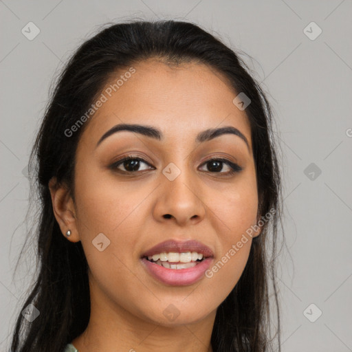 Joyful latino young-adult female with long  brown hair and brown eyes