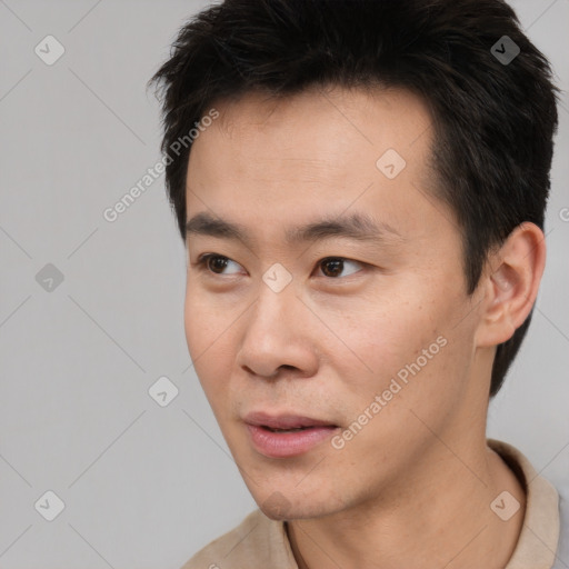 Neutral asian young-adult male with short  black hair and brown eyes
