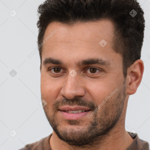 Joyful white young-adult male with short  brown hair and brown eyes