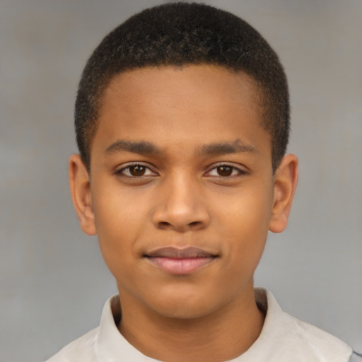 Joyful latino child male with short  brown hair and brown eyes
