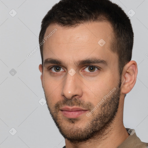 Neutral white young-adult male with short  brown hair and brown eyes