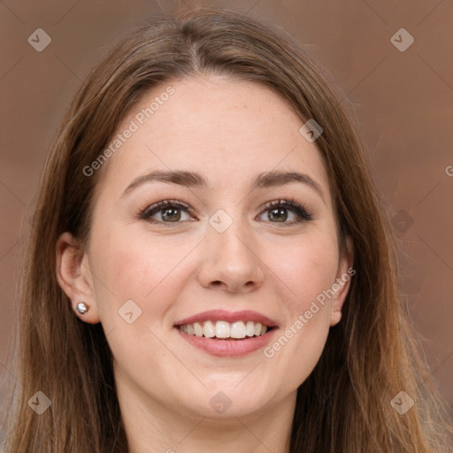 Joyful white young-adult female with long  brown hair and grey eyes