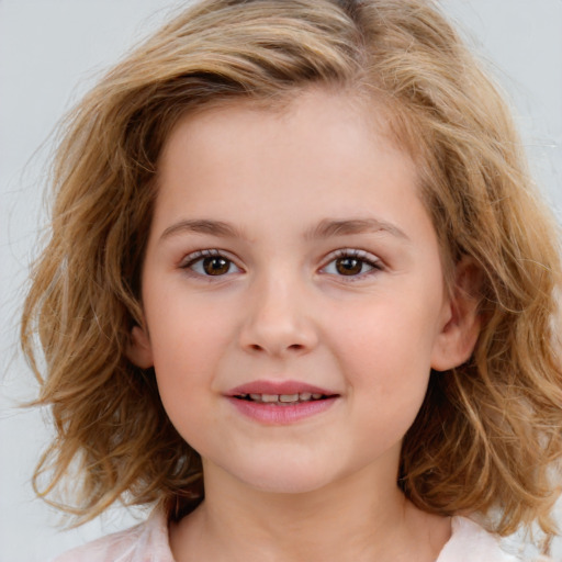 Joyful white child female with medium  brown hair and brown eyes