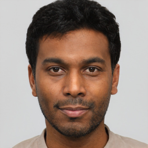 Neutral black young-adult male with short  black hair and brown eyes