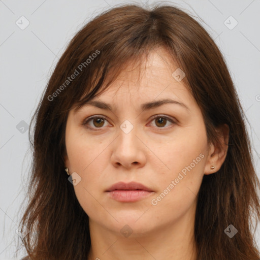 Neutral white young-adult female with long  brown hair and brown eyes