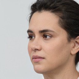 Neutral white young-adult female with short  brown hair and brown eyes