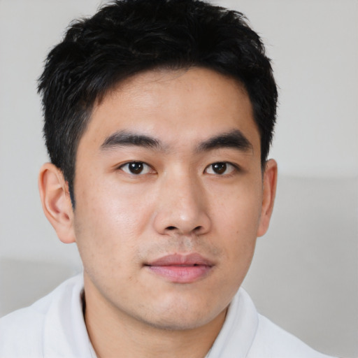 Neutral asian young-adult male with short  black hair and brown eyes