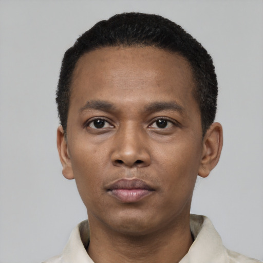 Neutral black young-adult male with short  black hair and brown eyes