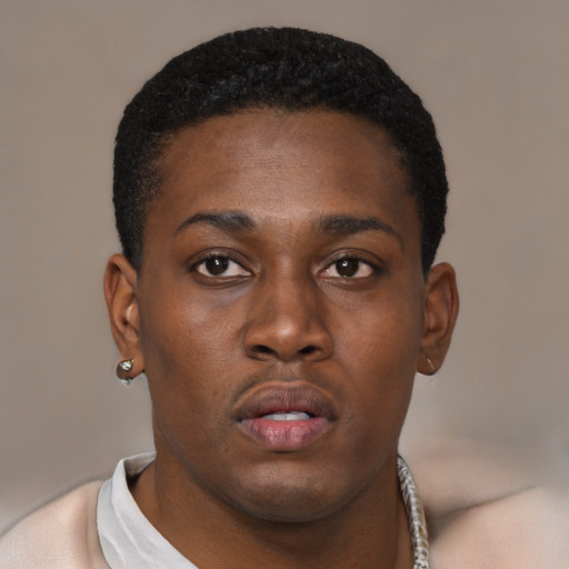 Neutral black young-adult male with short  black hair and brown eyes