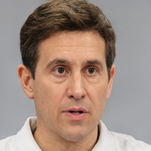 Neutral white adult male with short  brown hair and brown eyes