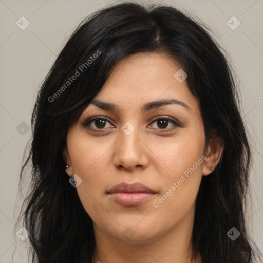 Joyful latino young-adult female with long  brown hair and brown eyes