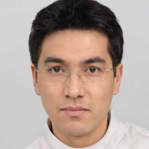 Neutral white young-adult male with short  black hair and brown eyes
