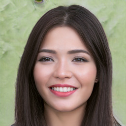 Joyful white young-adult female with long  black hair and brown eyes